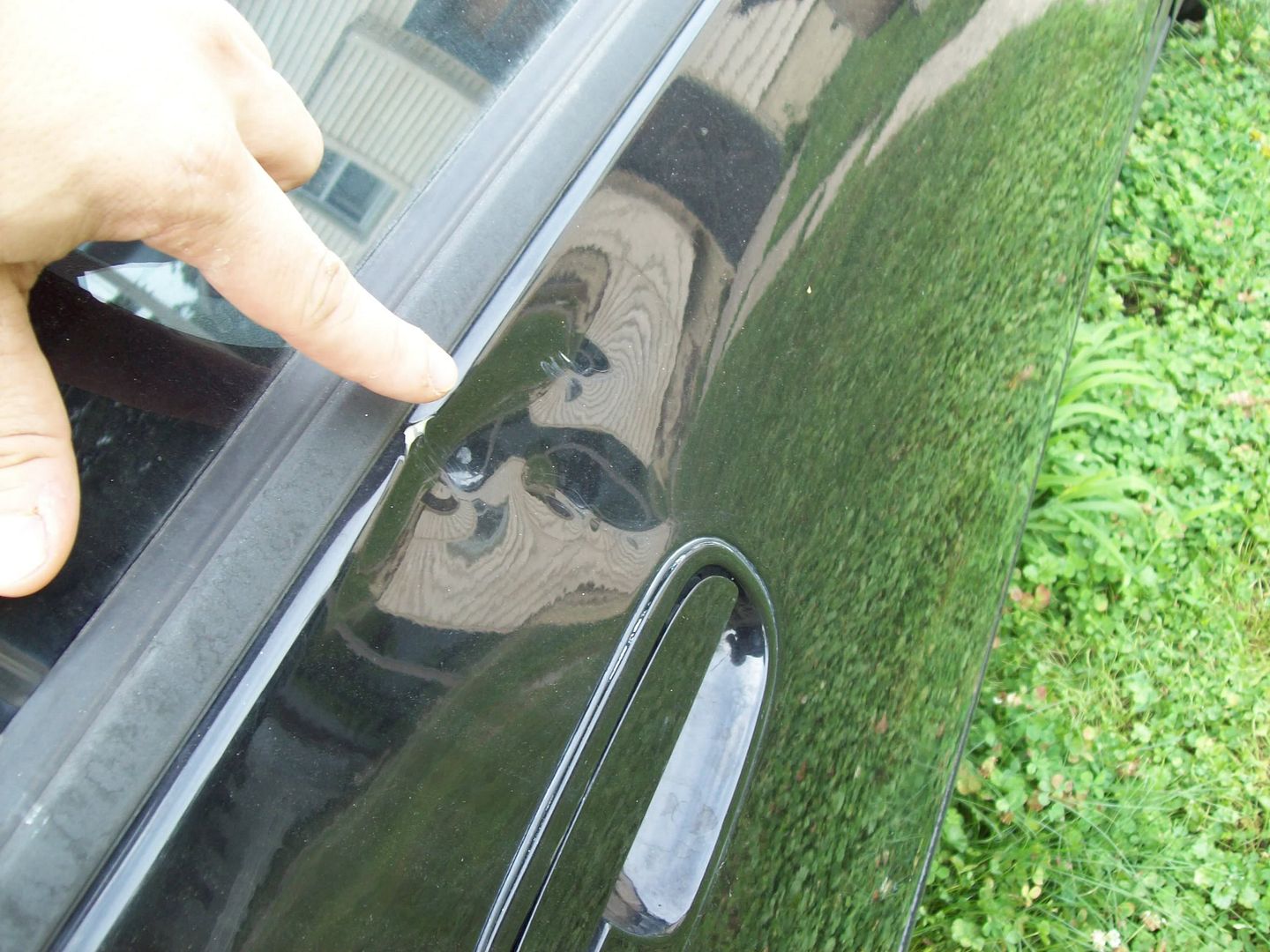 dent above ps door handle